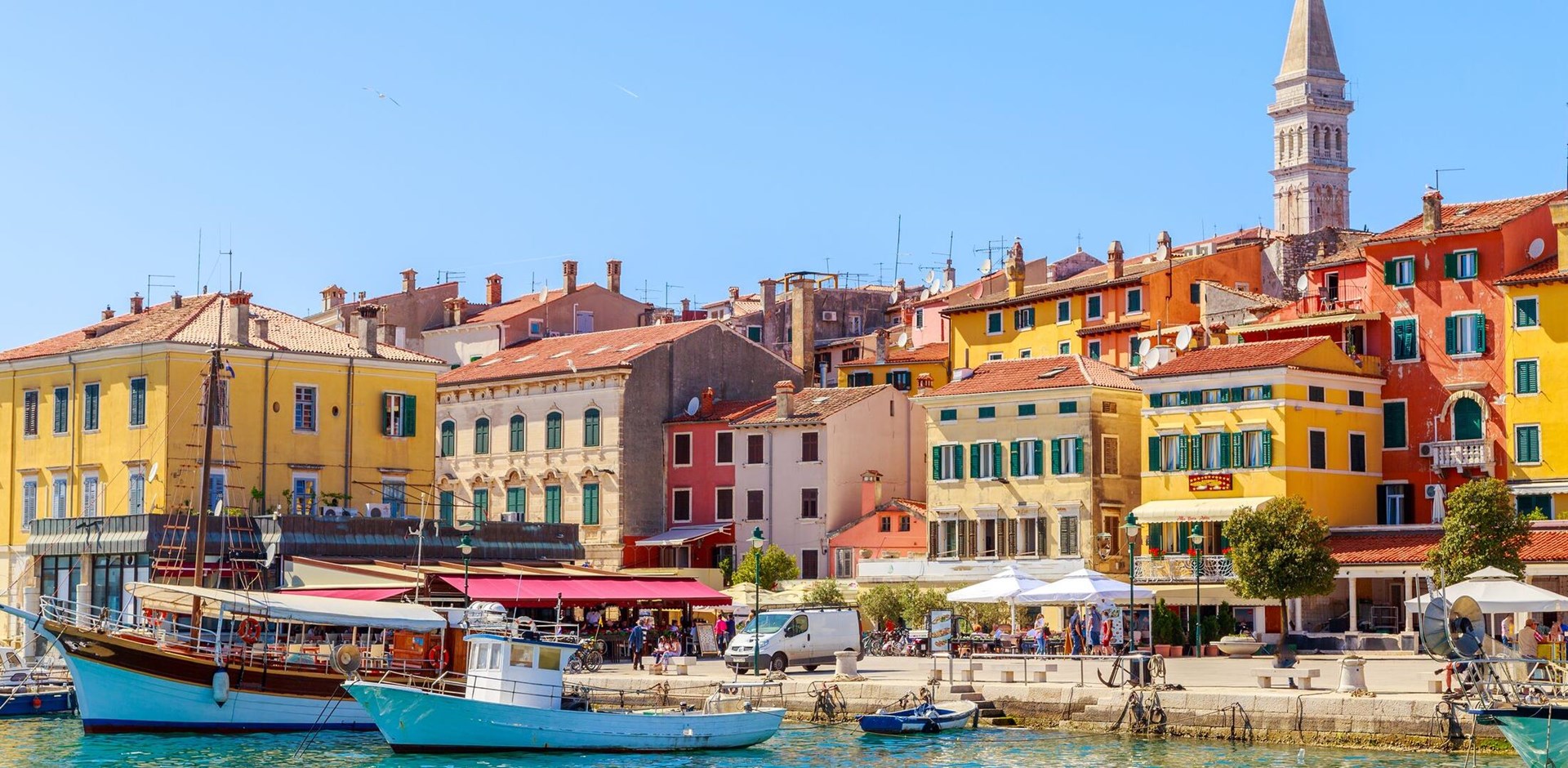 Colorful Rovinj in Istria with boats in the port, Croatia