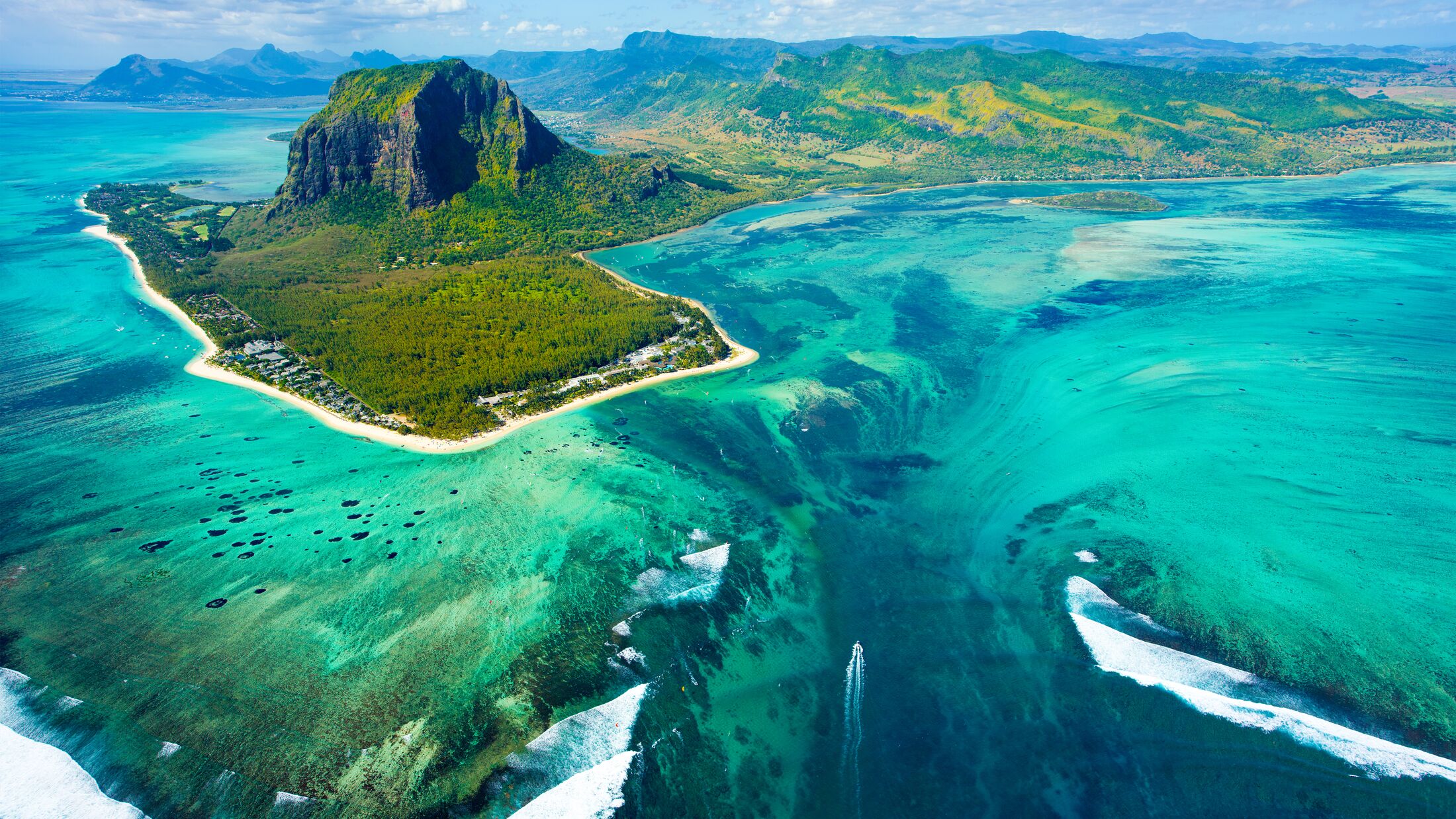 Aerial view of Mauritius island panorama and famous  Le Morne Brabant mountain, beautiful blue lagoon and underwater waterfall